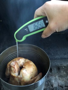 Cornish Hen cooking in Tin Can Smoker temped at 156F